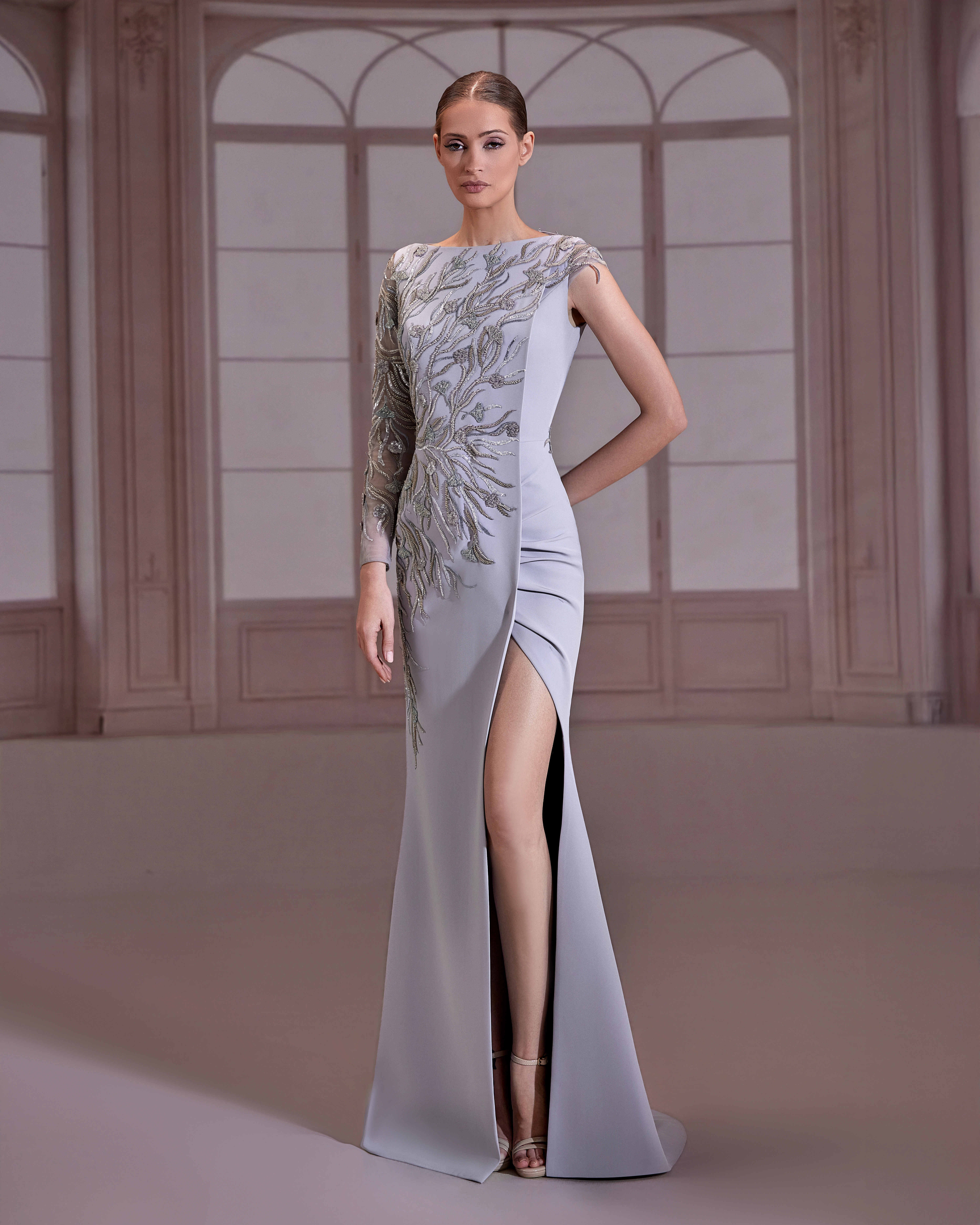 SS289- Silver crfepe dress features an asymmetrical one-sleeve designSilver US 01