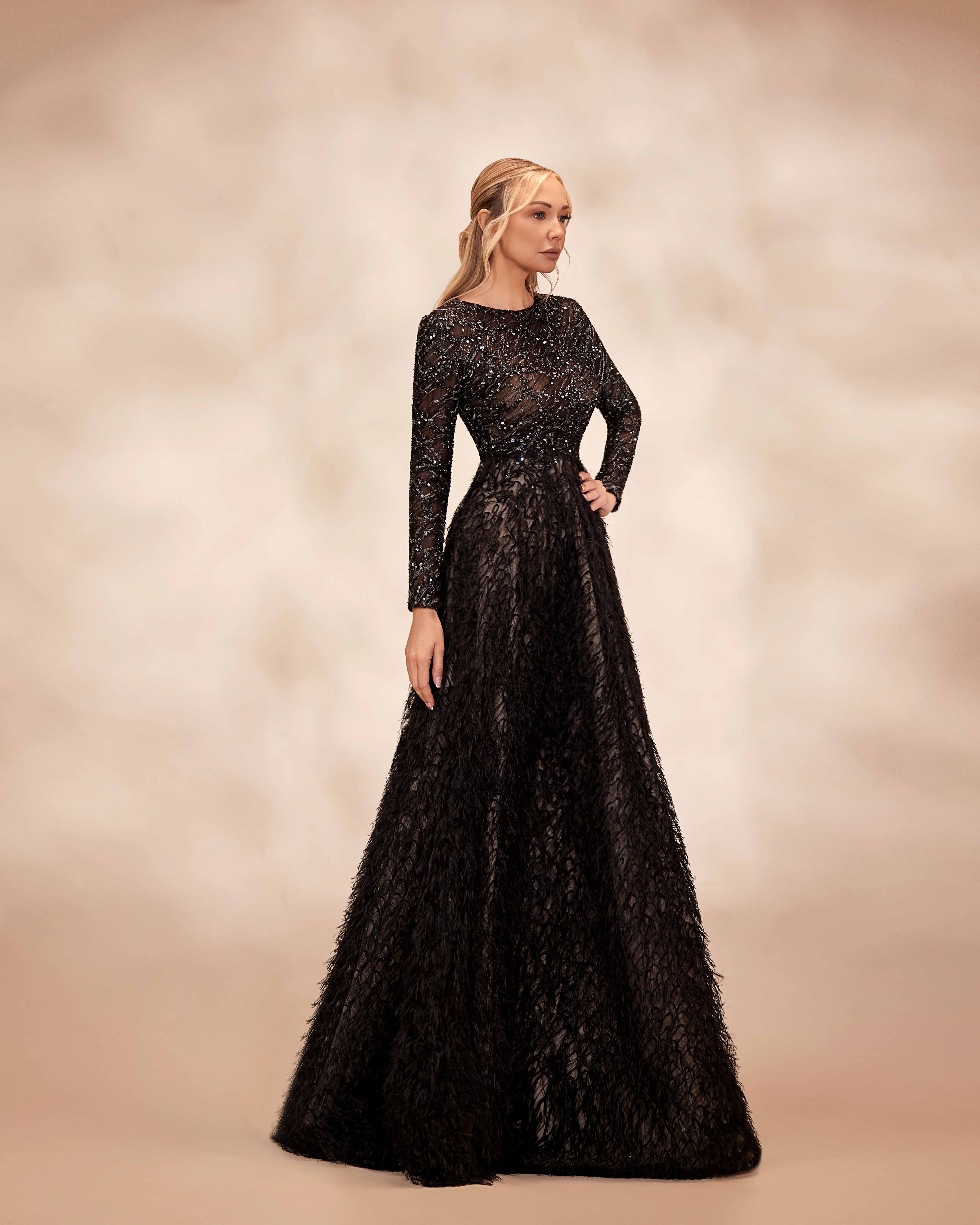 SS12- Black dress with draped long-sleeve bodice embellished with silver threadworkBlack  US 01